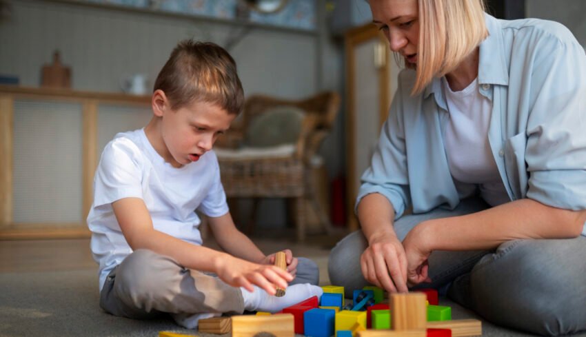 mother-playing-with-her-autistic-son-using-toys (1)