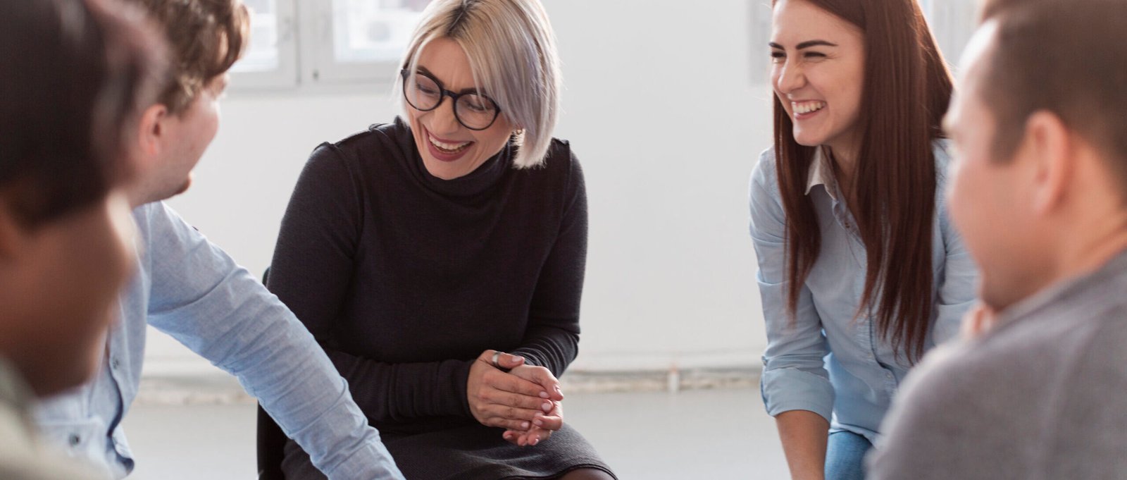 smiling-rehab-patients-looking-each-other